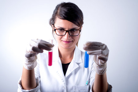 scientist with cure in hands