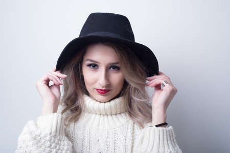 cute girl with hat on her headの写真素材