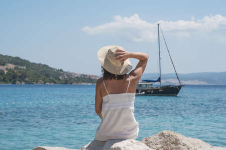 girl enjoying seasideの写真素材