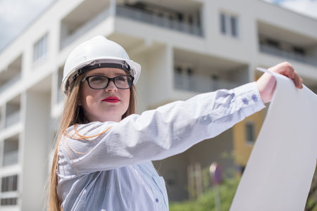 architect holding blueprintsの写真素材