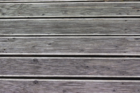 Terrace wooden platform. A wooden platform in the park. Decking wood path