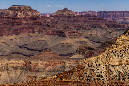 Hiking trail leading into the middle of the Grand Canyon where tourists often campの写真素材