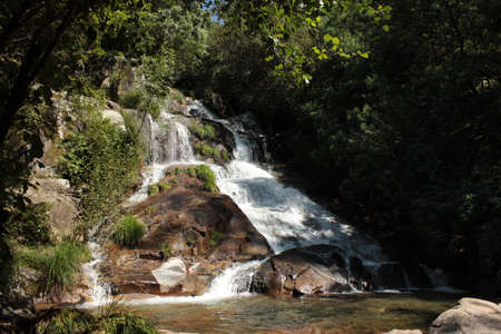 Waterfall of the San Xusto river next to the monastery of San Xusto de Toxosoutos in Noia.の写真素材
