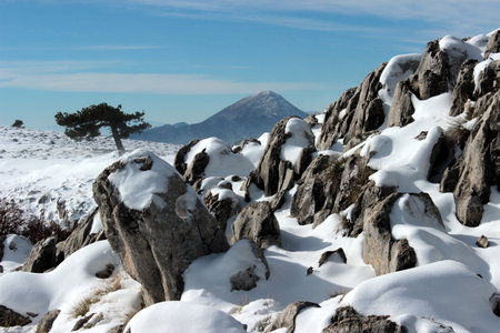 Winter view of the peak of La Sagra from Las Cabras mountain rangeの写真素材