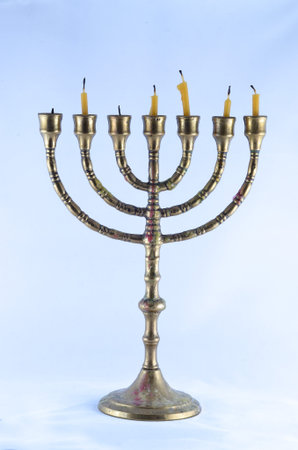 Old menorah with short candles.の写真素材