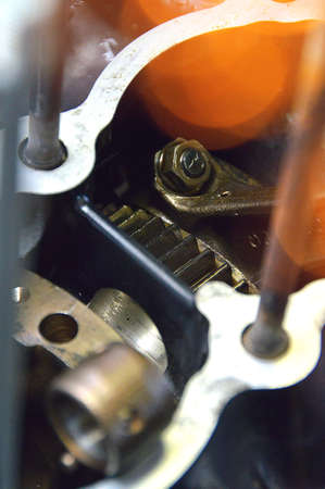 closeup photo of metal gear changer for a motorcycleの写真素材