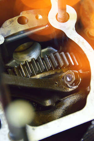closeup photo of motorcycle gearbox with metal gearの写真素材