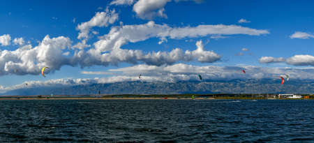 kite surfers on summer beachの写真素材