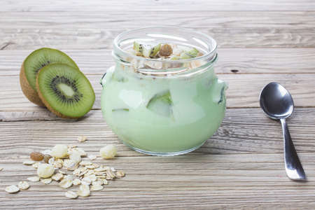 yogurt with fresh kiwiの写真素材