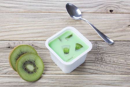 yogurt with fresh kiwiの写真素材
