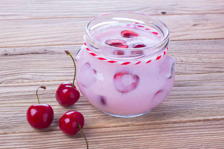 yogurt with fresh red berriesの写真素材