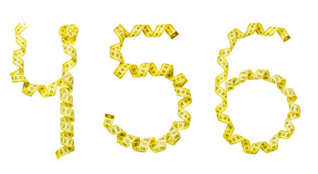 Number made from Yellow centimeter tape. Isolated four, five, six