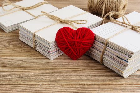 Blank white post cards, empty postcard, postcrossing, Red heart love letterの写真素材