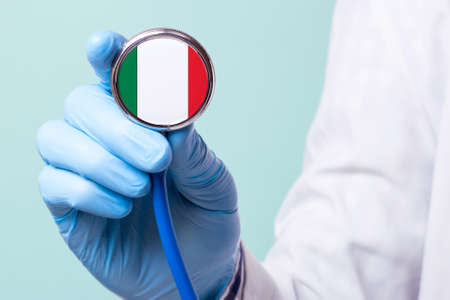 Medicine in Mexico is free and paid. Expensive medical insurance. Treatment of disease at the highest level Doctor holding a stethoscope in his handの写真素材