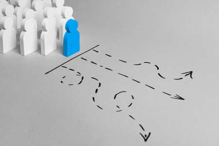 The leader leads the team on the right path towards the goal. Choice of the road. Conceptの写真素材