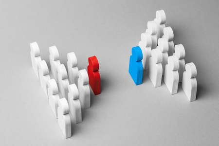 Competition of two business teams. Two groups of people in the discussion. Conflict among workers. Group of white men with their leaders of red and blue. Conceptの写真素材