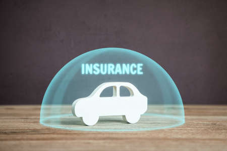 Car insurance. Car under the protective cap bubble, hemisphereの写真素材