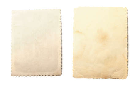 Old photos isolated on white background. Mock-up blank paper. Postcard rumpled and dirty vintage. Retro cardの写真素材