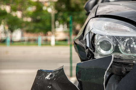 Car is broken in front. Bumper and headlight brokenの写真素材