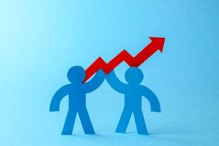 Business team and red up arrow. Sales growth and growth graph upの写真素材