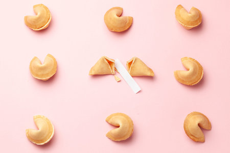 Chinese fortune cookies. Cookies texture pattern with empty blank inside for word prediction. Pink...