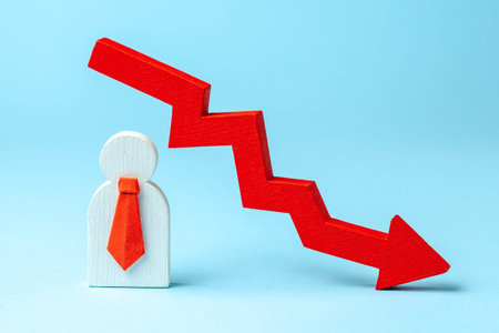 Employee leader in tie with an arrow down on blue background. Falling profits