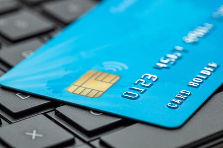 Credit card on keyboard with laptop. Online payment for purchases from online stores. Online...