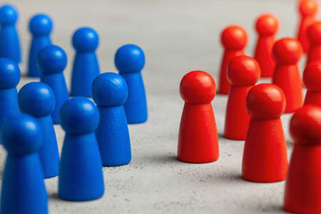 Two business teams are facing each other. The concept of competition, confrontation in businessの写真素材