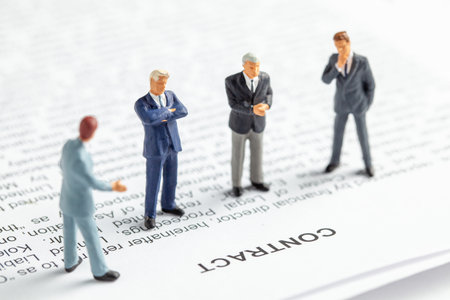 Group of businessmen in suit and tie are discussing contact. The conclusion of the contract between...