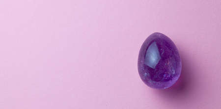 YONI EGG. The simulator of the female genital organs, vagina. Egg of stone. Copy space for textの写真素材