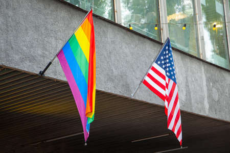 Flags of America and the LGBT community on the building. Sexual minorities in USAの写真素材