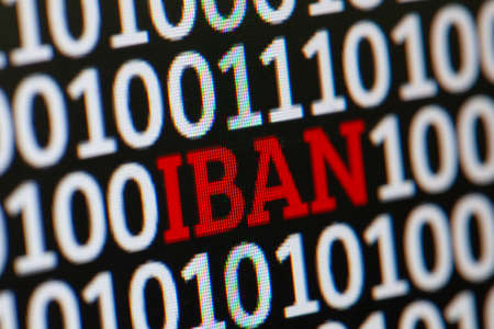 IBAN. International Bank Account Number. Binary code of zeros and ones in the backgroundの写真素材