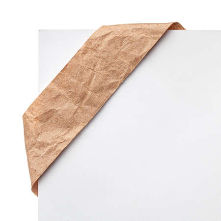 Paper ribbon bookmark or label tags. Craft corner crumpled paper on a white background.の写真素材