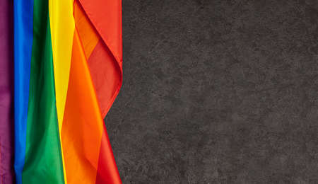 LGBT Pride Rainbow Flag. Black background.の写真素材