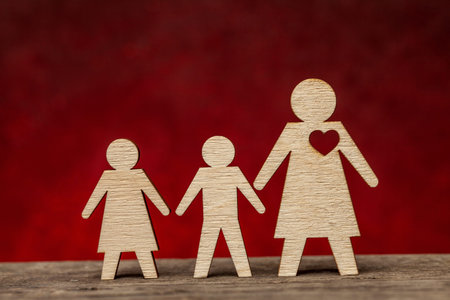 Single mother. Mom alone brings up children without a father.の写真素材