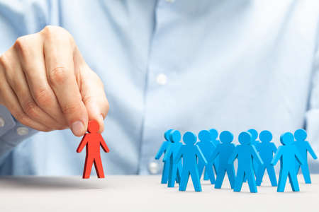 Staff recruitment. Choosing a good leader. Boss keeps subordinateの写真素材