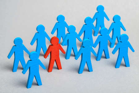 Team Leader. HR. The right choice of staff. Blue men and red leaderの写真素材