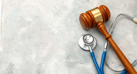 Judge gavel and stethoscope. The law in medicine, the sentence on medical negligenceの写真素材