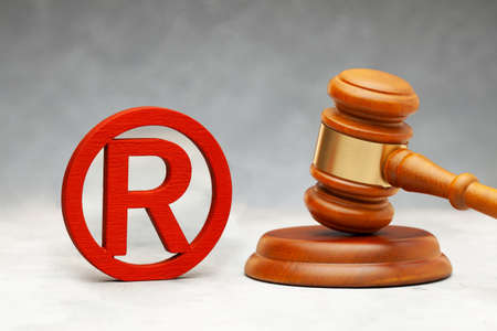 Judge gavel and red wood trademark signの写真素材