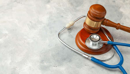 Judge gavel and stethoscope. The law in medicine, the sentence on medical negligenceの写真素材