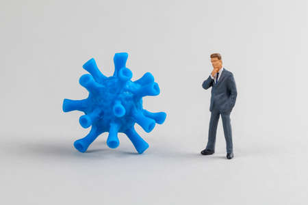 Virus and businessman. How to do business in a pandemicの写真素材