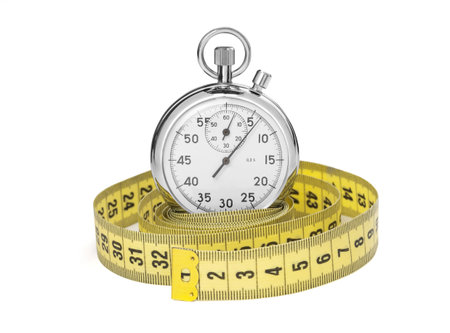 Stopwatch and yellow measuring tape. isolated on white background