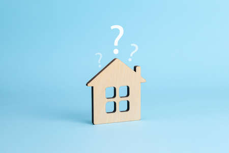 House and question mark. House selection concept. Blue backgroundの写真素材