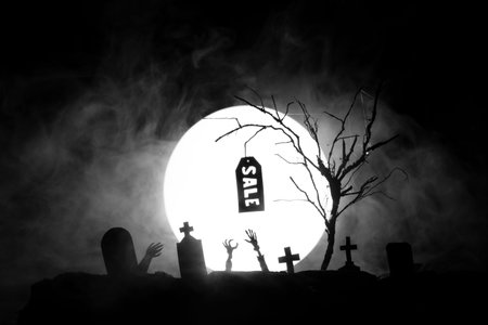 Day of the Dead Sale. Halloween. Cemetery with graves and the dead are pulling hands and...