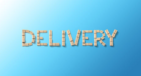 Word DELIVERY from cardboard boxes on blue backgroundの写真素材