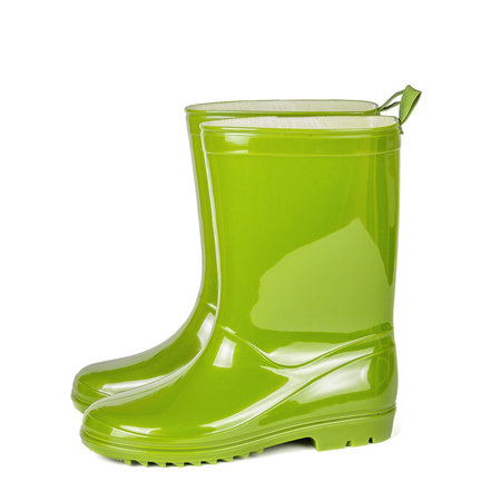 Green rubber boots isolated on white backgroundの写真素材