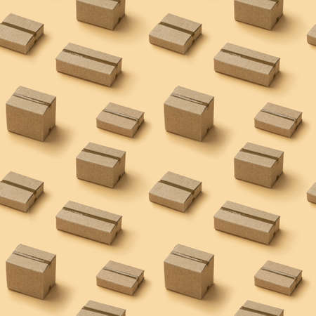 Cardboard boxes seamless pattern texture on brown backgroundの写真素材
