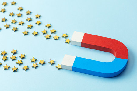 A magnet attracts stars. Concept Get positive feedback.の写真素材