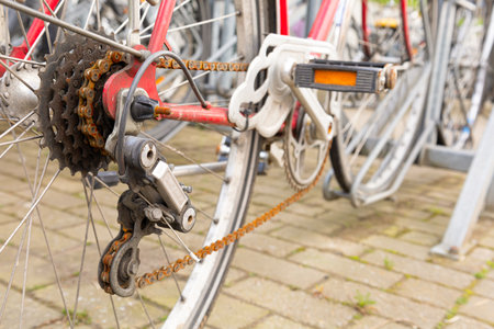 Old bicycle with a rusty chain and system.の写真素材