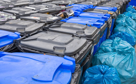 Lots of plastic trash cans. Garbage sorting.の写真素材